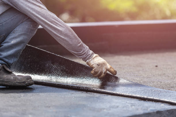 Professional Waterproofing technician working in Oakdale, NY